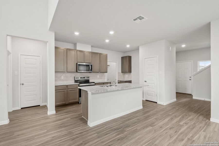 Furnished interior view inside a new home in Cinco Lakes, San Antonio (Image 10).