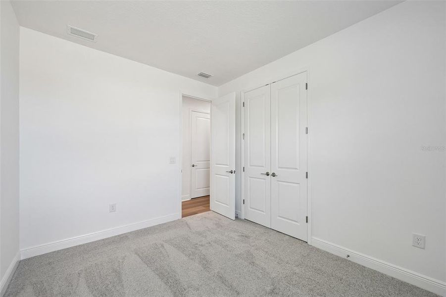 Spacious, unfurnished interior of a new home in Grand Park, Sarasota (Image 26).