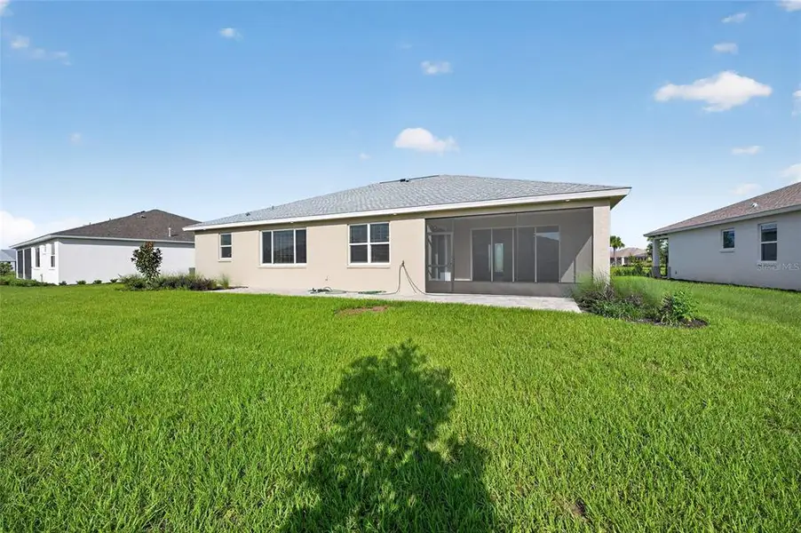 Exterior details and patio area of a home in , Ocala (Image 31).