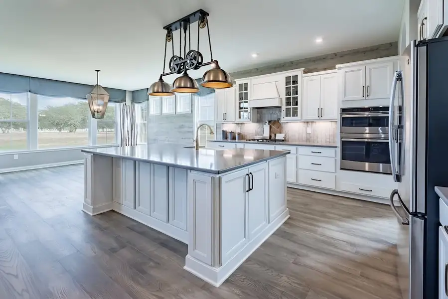 Representative furnished interior of a home built from the Paxton by Fischer Homes in Governor’s Preserve, Canton (Image 39).
