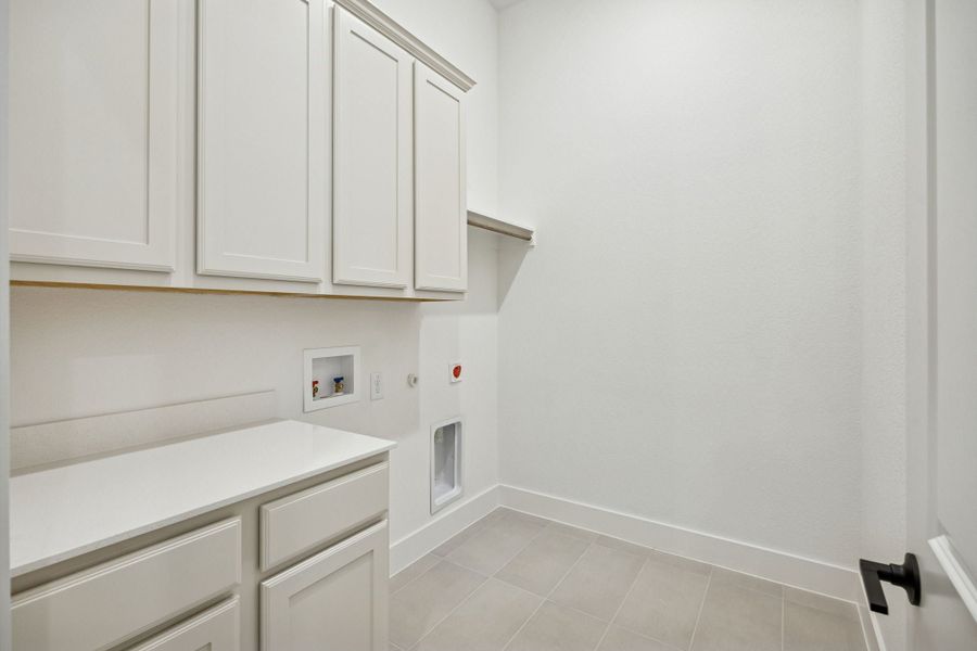 Furnished interior view inside a new home in Newman Village Townhomes, Frisco (Image 14).
