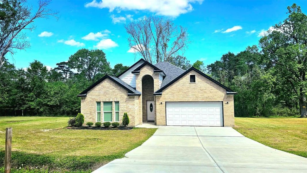 Front exterior of a new home in , Kenefick, TX, highlighting curb appeal (Image 24).