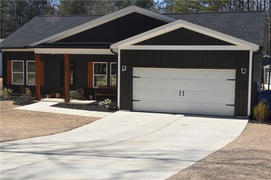Front exterior of a new home in , Dallas, GA, highlighting curb appeal (Image 17).