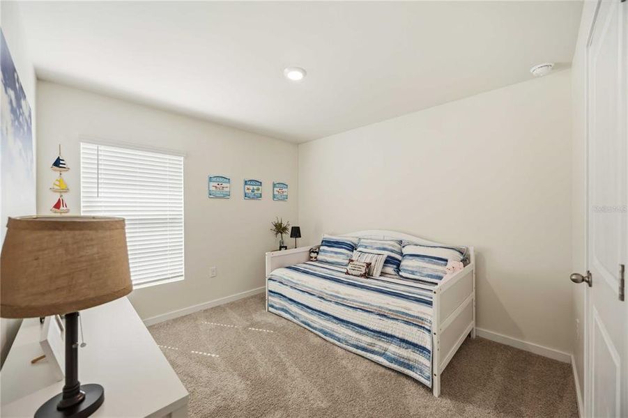 Furnished interior view inside a new home in Central Parc, North Port (Image 33).