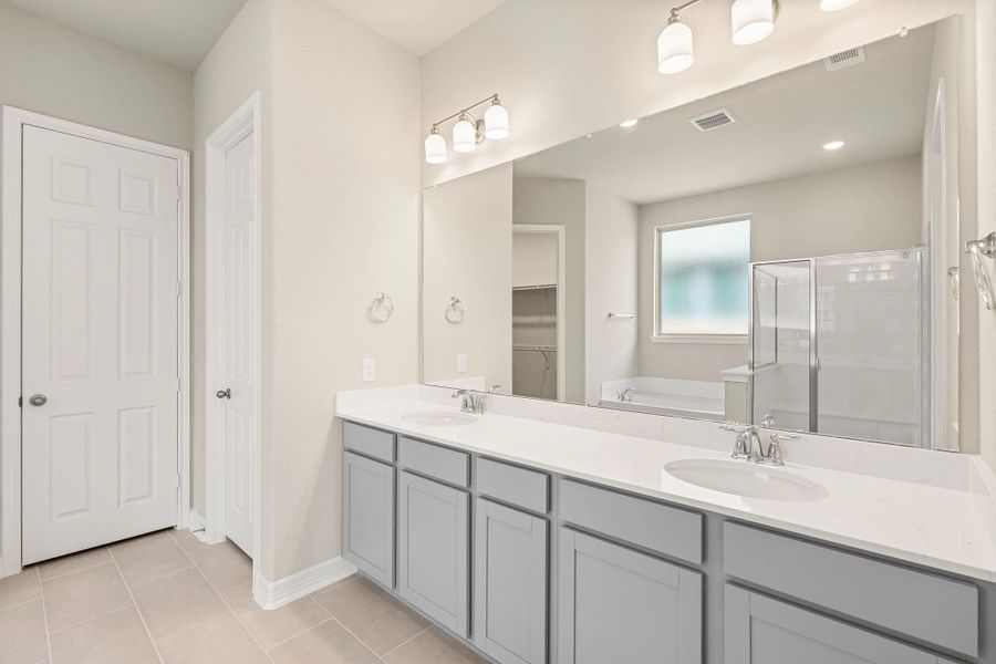 Furnished interior view inside a new home in Sunterra Lakes, Brookshire (Image 7).