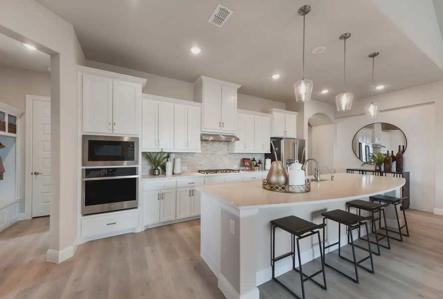 Representative furnished interior of a home built from the Winchester by Chesmar Homes in Canyon Falls, Argyle (Image 3).