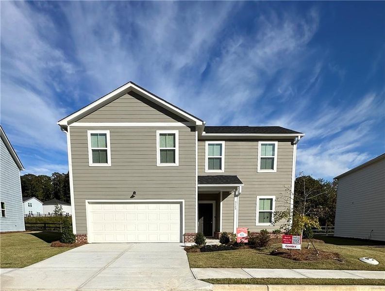 Front exterior of a new home in Avery Ridge, Gainesville, GA, highlighting curb appeal (Image 1).