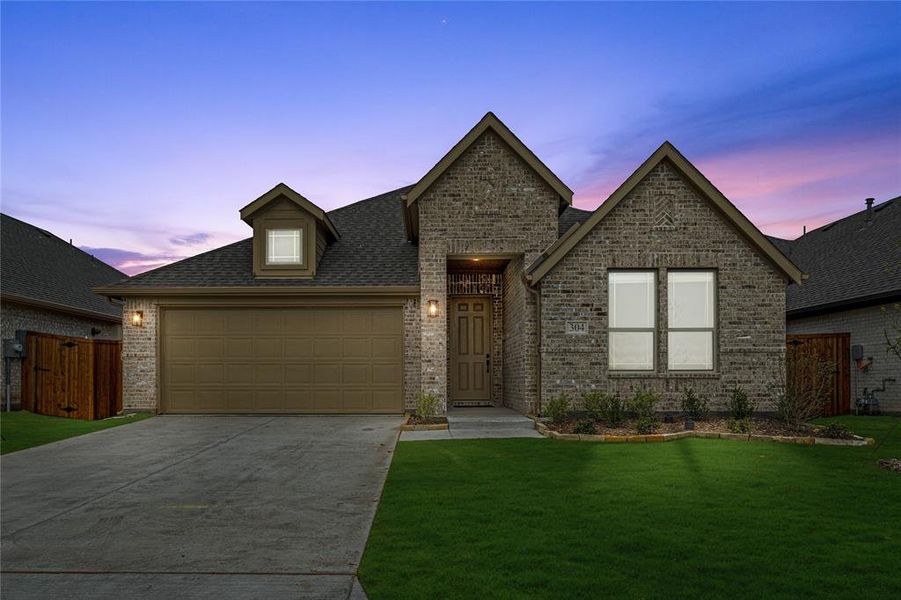 Front exterior of a new home in East Oak Creek 50-55, Commerce, TX, highlighting curb appeal (Image 2). Front exterior of a new home in East Oak Creek 50-55, Commerce, TX, highlighting curb appeal (Image 2).
