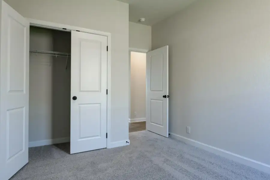 Representative unfurnished interior of a home built from the Brodie by Ashton Woods in Saddlebrook Ranch, Schertz (Image 17).