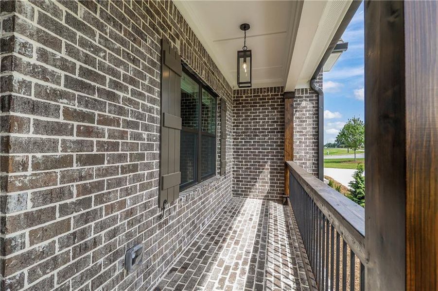 Exterior details and patio area of a home in Stonegate, Monroe (Image 29).