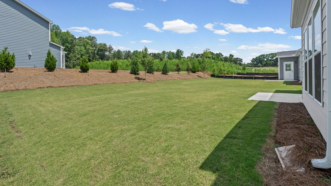 Exterior details and patio area of a home in Hunters Creek, Flowery Branch (Image 25). Exterior details and patio area of a home in Hunters Creek, Flowery Branch (Image 25).