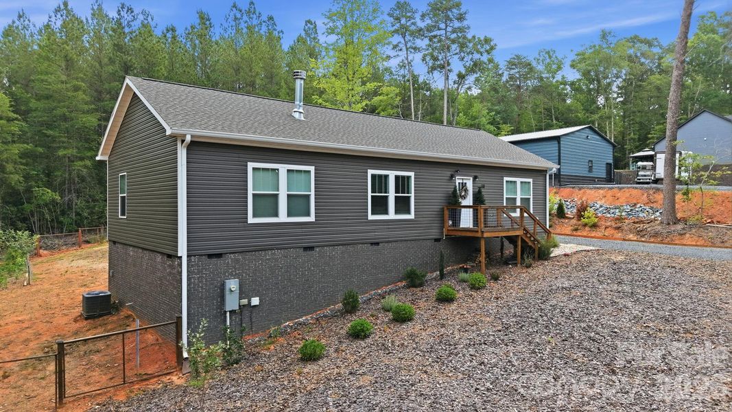 Exterior details and patio area of a home in , Troy (Image 24). Exterior details and patio area of a home in , Troy (Image 24).
