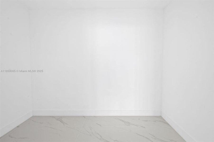 Spacious, unfurnished interior of a new home in Aria Reserve, Miami (Image 19). Spacious, unfurnished interior of a new home in Aria Reserve, Miami (Image 19).