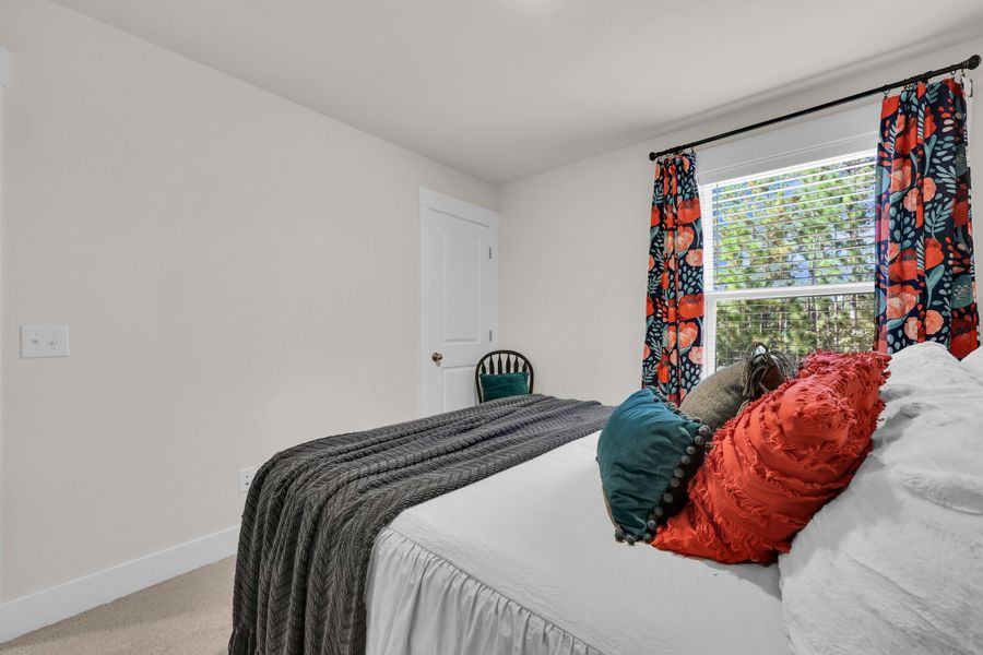 Furnished interior view inside a new home in Jasmine Point at Lakes of Cane Bay, Summerville (Image 29).