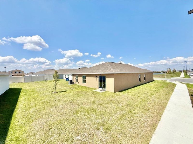 Exterior details and patio area of a home in Ranches at Lake McLeod, Eagle Lake (Image 3).