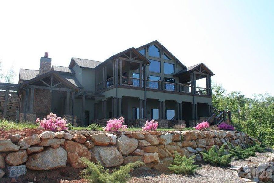 Front exterior of a new home in , Lake Lure, NC, highlighting curb appeal (Image 18).