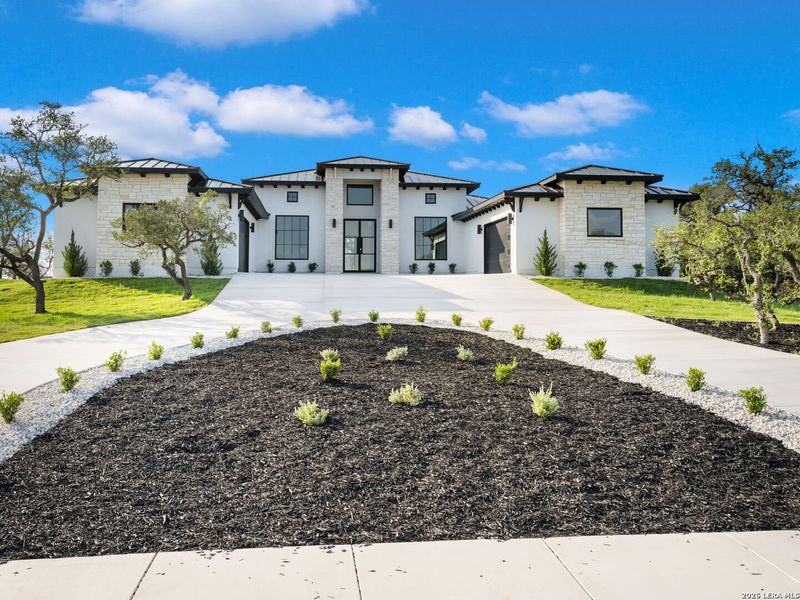 Front exterior of a new home in , Boerne, TX, highlighting curb appeal (Image 2). Front exterior of a new home in , Boerne, TX, highlighting curb appeal (Image 2).