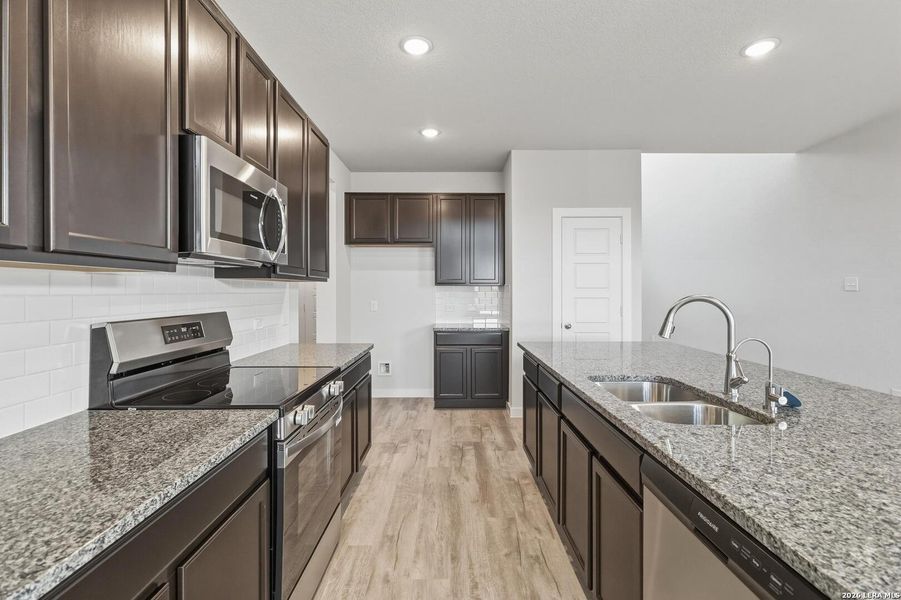 Furnished interior view inside a new home in Red Hawk Landing, San Antonio (Image 14).