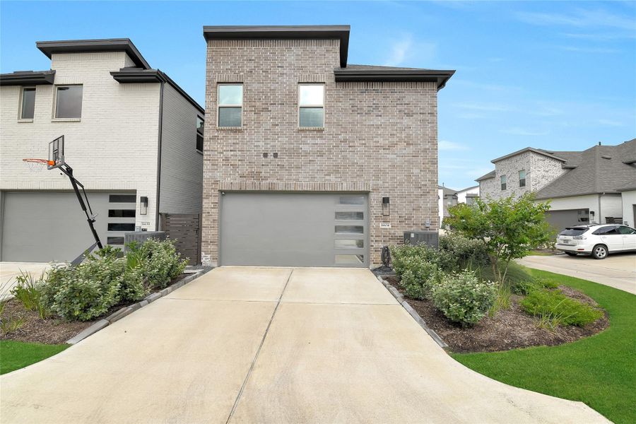 Rear entry double car garage. The garage is extra wide inside offering convenient extra space for storage or maybe parking a motorcycle.