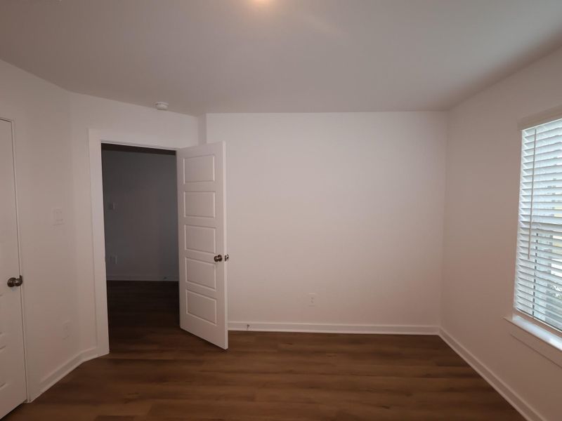 Spacious, unfurnished interior of a new home in Pinewood at Grand Texas, New Caney (Image 27).