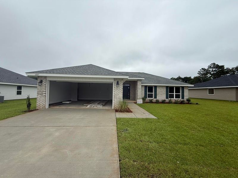 Front exterior of a new home in Ashton View, Crestview, FL, highlighting curb appeal (Image 1). Front exterior of a new home in Ashton View, Crestview, FL, highlighting curb appeal (Image 1).