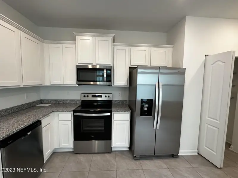 Furnished interior view inside a new home in , St. Augustine (Image 9).