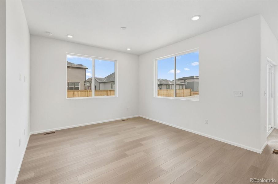 Spacious, unfurnished interior of a new home in The Cottages Collection at Ridgeline Vista, Brighton (Image 20).