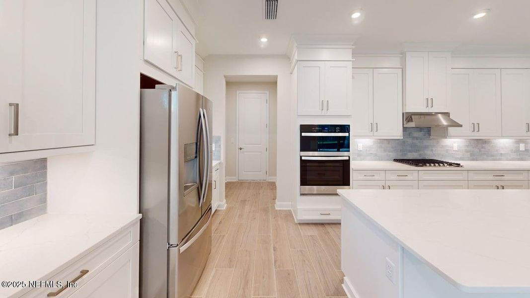 Furnished interior view inside a new home in RiverTown - WaterSong, St. Johns (Image 4).