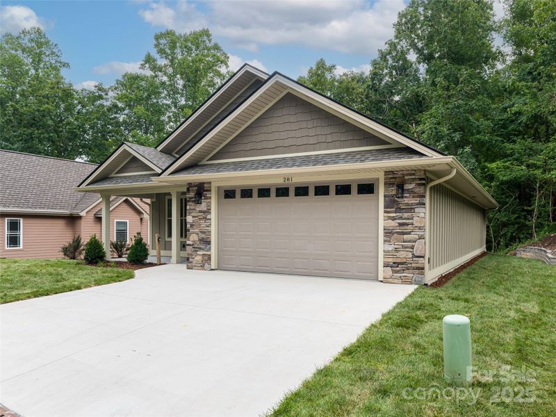 Front exterior of a new home in , Hendersonville, NC, highlighting curb appeal (Image 26).