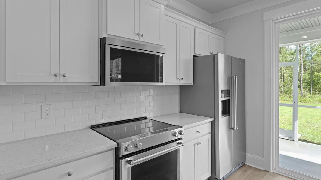 Representative furnished interior of a home built from the HARRIS by D.R. Horton in Sheep Island, Summerville (Image 9).