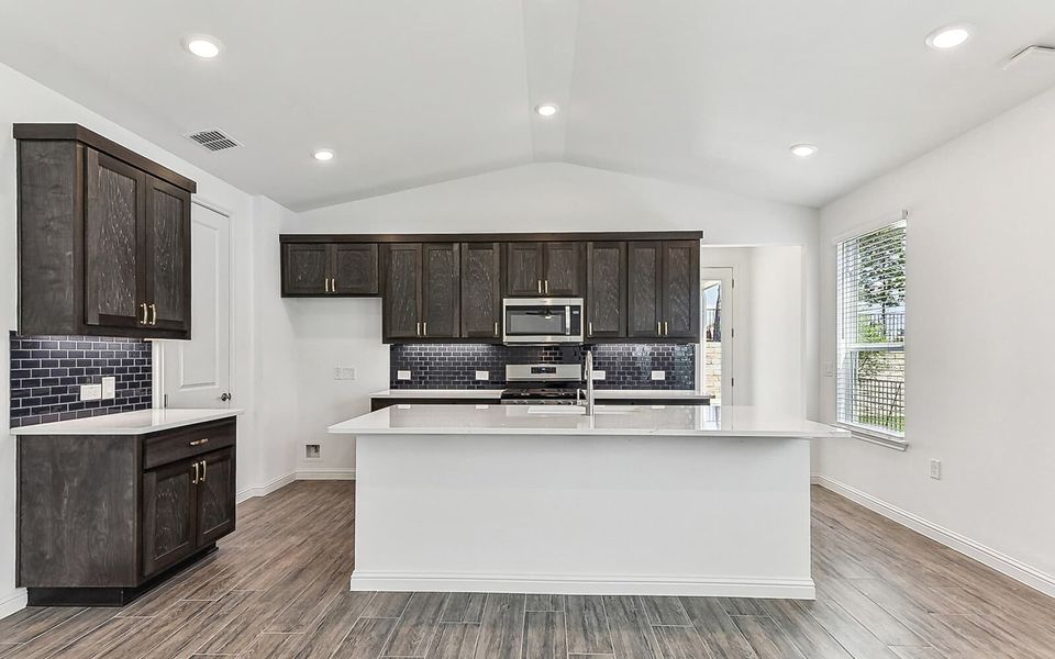 Furnished interior view inside a new home in Kissing Tree, San Marcos (Image 5).