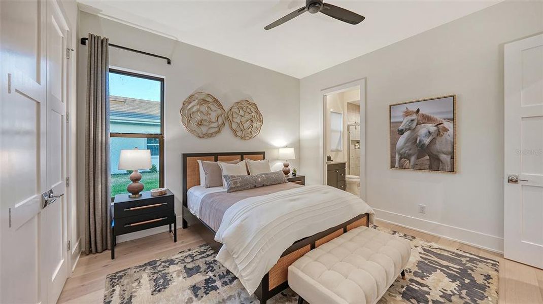 Furnished interior view inside a new home in Wild Blue at Waterside, Sarasota (Image 74).