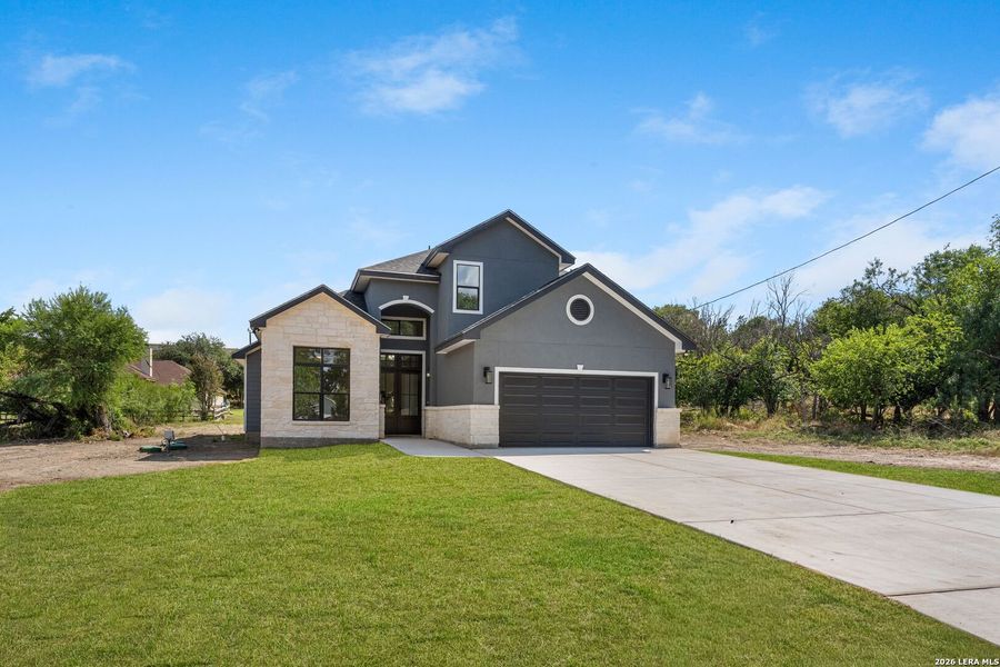 Front exterior of a new home in , Selma, TX, highlighting curb appeal (Image 31).