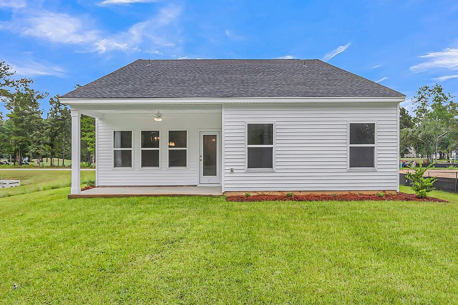 Exterior details and patio area of a home in Fairway Woods at Wyboo, Manning (Image 21).