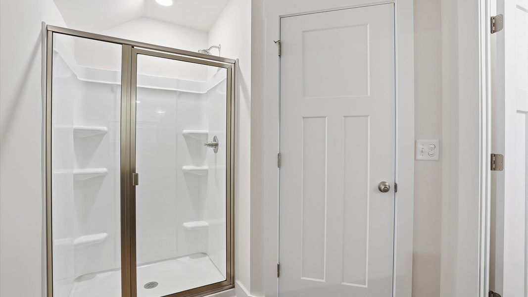 Accomplished full bath designed with both comfort and sophistication in mind Accomplished full bath designed with both comfort and sophistication in mind