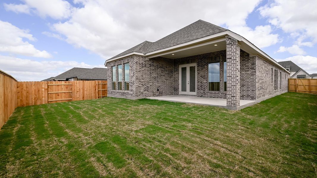 Exterior details and patio area of a home in Crosswinds, Kyle (Image 22).