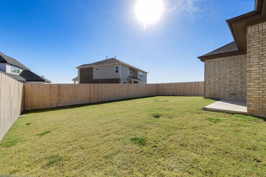 Exterior details and patio area of a home in Blackhawk in Pflugerville, Pflugerville (Image 3).