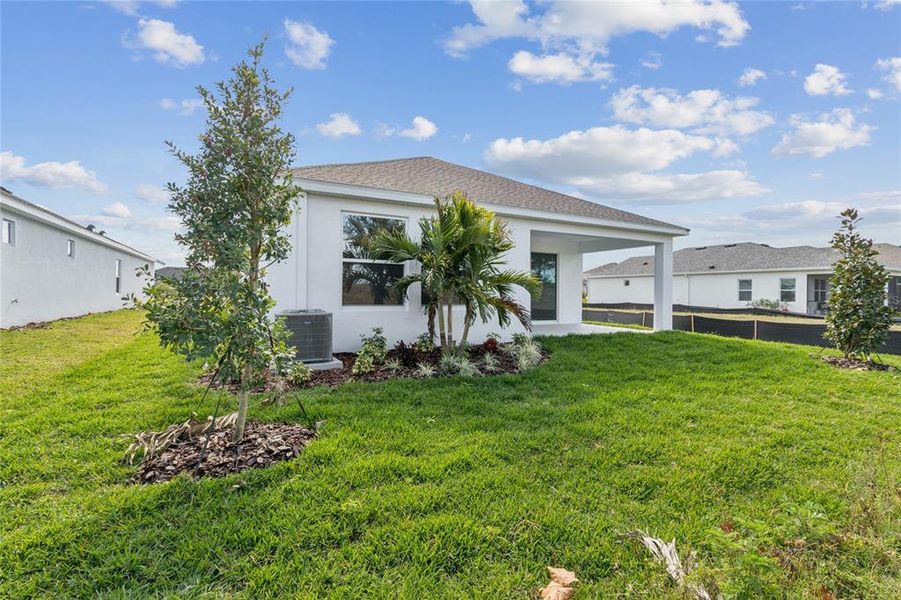 Exterior details and patio area of a home in North River Ranch - Cottage Series, Parrish (Image 25).