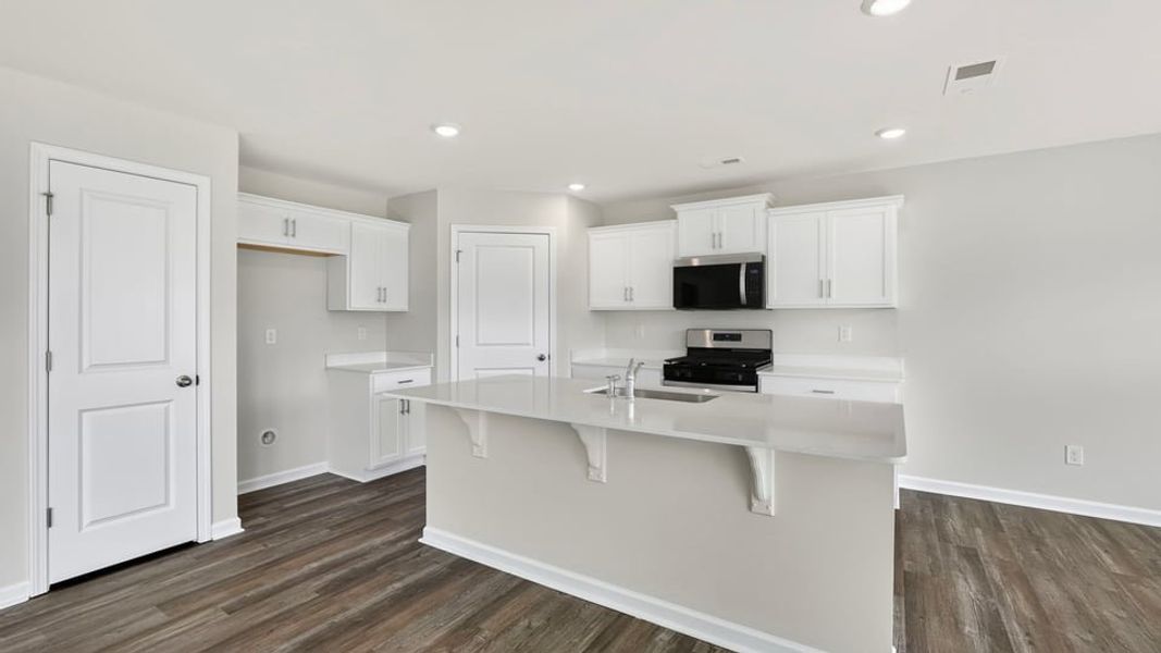 Furnished interior view inside a new home in Harper Ridge, Roebuck (Image 7).