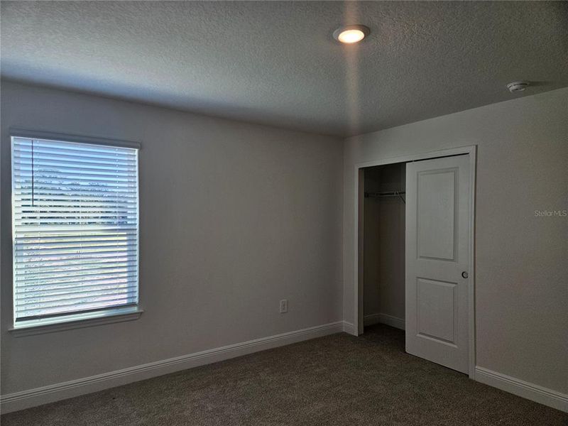 Spacious, unfurnished interior of a new home in The Reserve at Hammock Oaks - Classic Series, Lady Lake (Image 21).