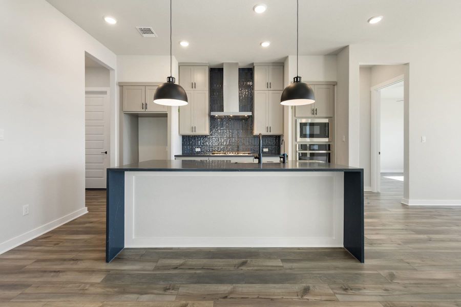 Furnished interior view inside a new home in Lagos Reserve, Manor (Image 12).