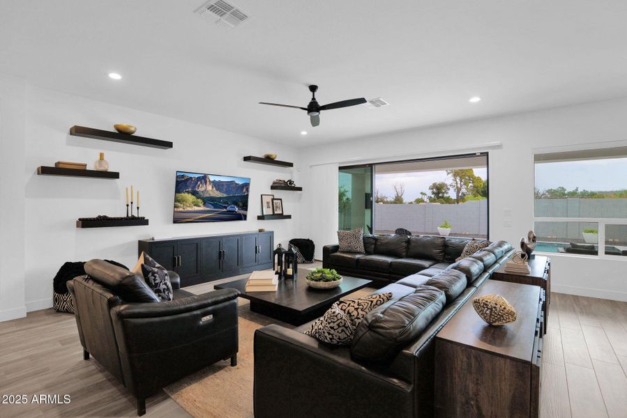 Great room w/sliding doors to pool area