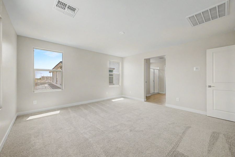 Spacious, unfurnished interior of a new home in Bentridge, Buckeye (Image 10). Spacious, unfurnished interior of a new home in Bentridge, Buckeye (Image 10).