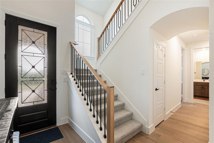 Entry Area with Beautiful Glass Accented Front Door