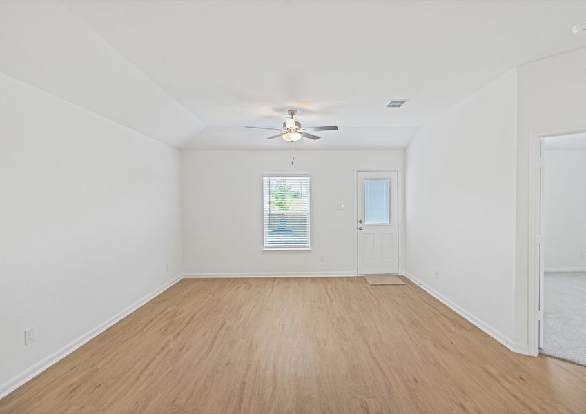 The foyer leads to the chef-ready kitchen