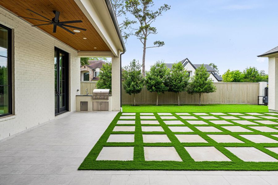 A natural extension of the patio, the summer kitchen is thoughtfully equipped w/ an Artisan grill, stainless steel sink & dedicated prep space. Designed for effortless outdoor entertaining and dining al fresco, with functionality to support both casual gatherings & larger-scale hosting. A natural extension of the patio, the summer kitchen is thoughtfully equipped w/ an Artisan grill, stainless steel sink & dedicated prep space. Designed for effortless outdoor entertaining and dining al fresco, with functionality to support both casual gatherings & larger-scale hosting.