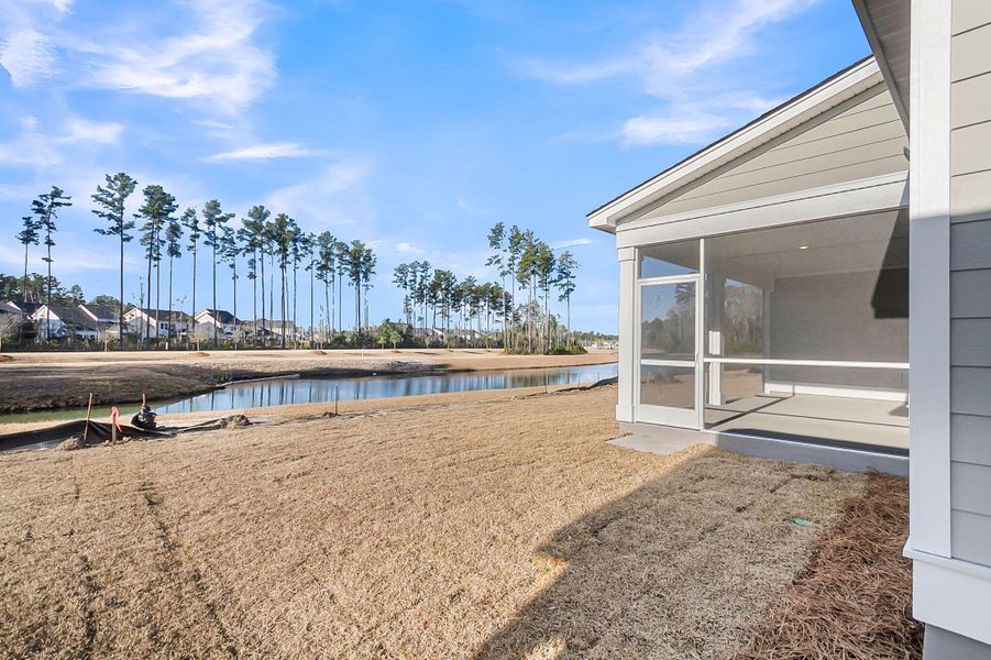 Exterior details and patio area of a home in Tidewater at Lakes of Cane Bay, Summerville (Image 3).