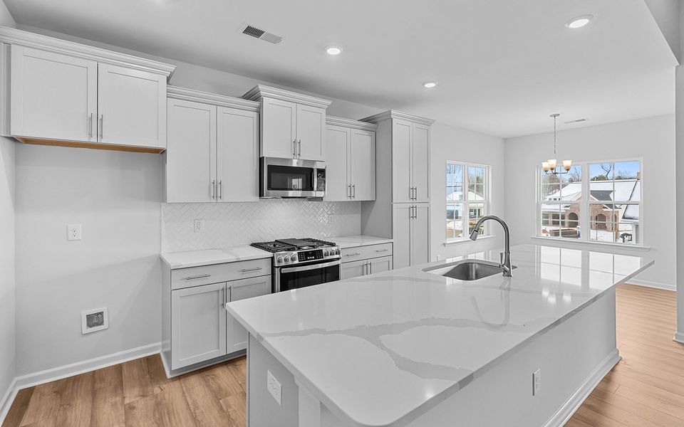 Furnished interior view inside a new home in Brayden, Advance (Image 7). Furnished interior view inside a new home in Brayden, Advance (Image 7).