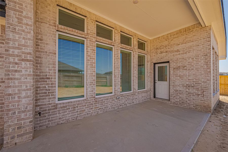 Exterior details and patio area of a home in La Segarra, Brookshire (Image 4).