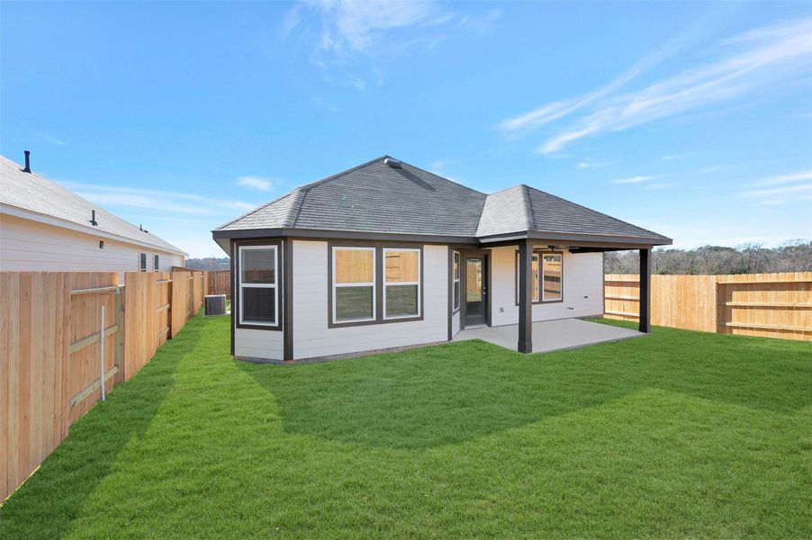 Exterior details and patio area of a home in Lone Star Landing, Montgomery (Image 26).